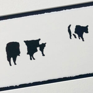 handmade stencilled print of a group of black and white striped cows (Belted Galloway breed) against unprinted plain white background