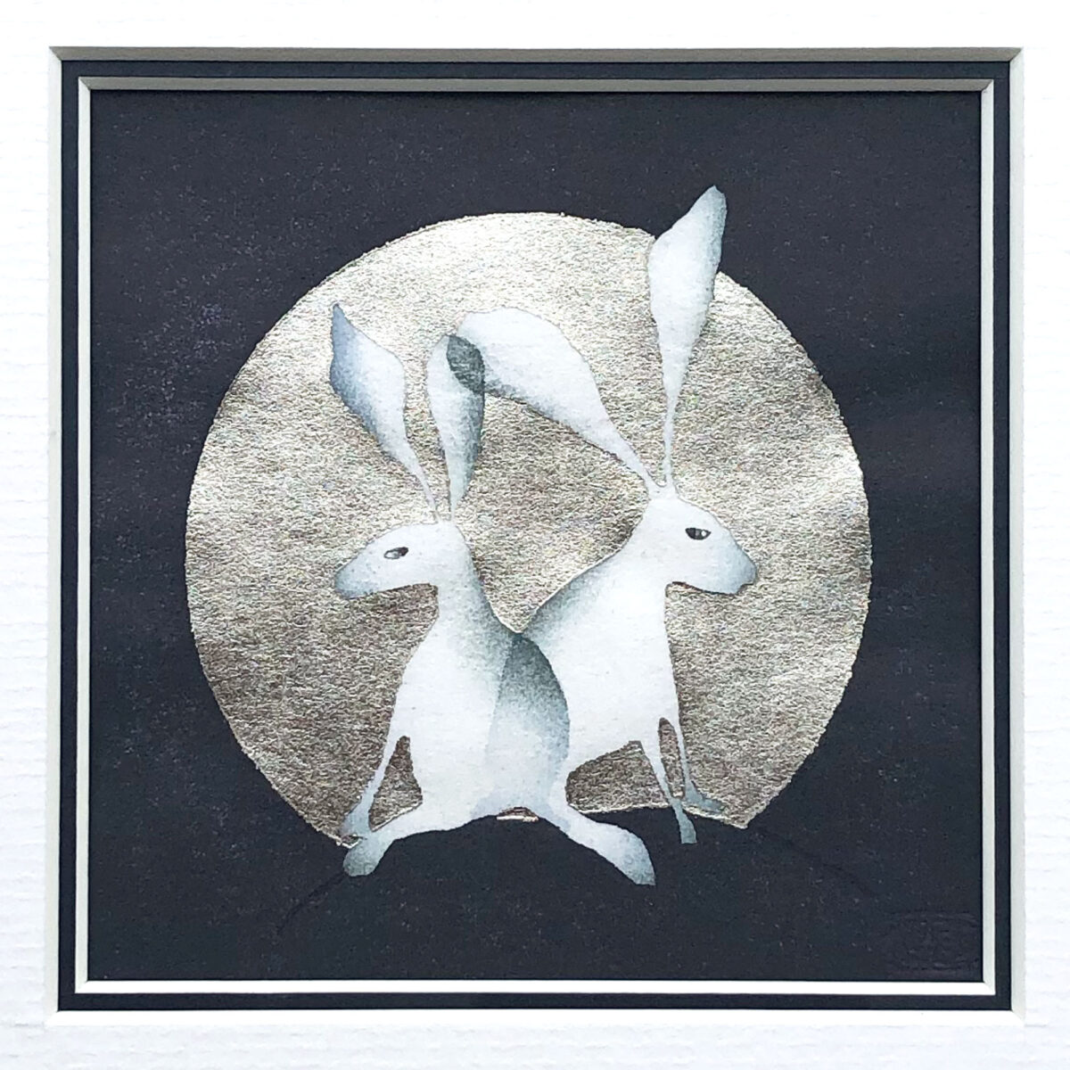 Blue Hares in a Winter Moon woodblock print by Claire Cameron-Smith